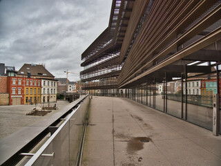Night shot of the Ghent Belfry, Belgium - A close-up, nocturnal view of the historic Ghent Belfry, showcasing the illuminated clock and gothic architecture against the dark sky.