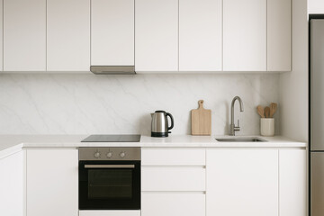 Minimalistic kitchen interior with white marble countertops and modern appliances