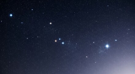 Night sky full of stars and a bright nebula.