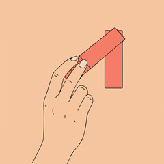 Hand holding a coral-colored rectangular shape on a peach background