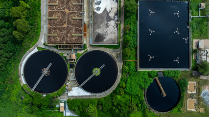 Aerial view circular clarifier tank at wastewater treatment plant, Industrial infrastructure, Environment technology sustainable water management system, Sedimentation tank circular clarifier.
