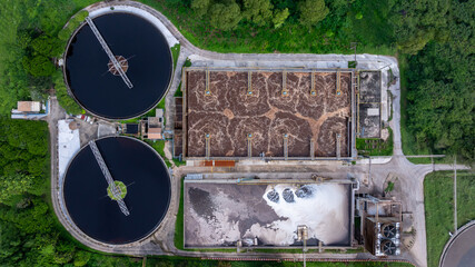 Aerial view circular clarifier tank at wastewater treatment plant, Industrial infrastructure, Environment technology sustainable water management system, Sedimentation tank circular clarifier.