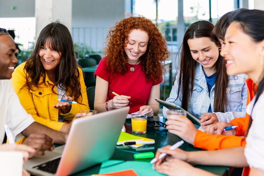 Young group of teenage student friends studying at high school campus. Education lifestyle and teamwork concept - Powered by Adobe