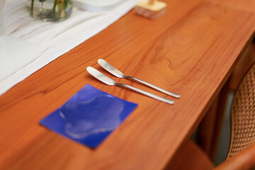 butter knife on a wooden table