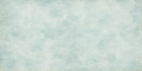 Fluffy white clouds in a bright blue sky with a cool winter feel