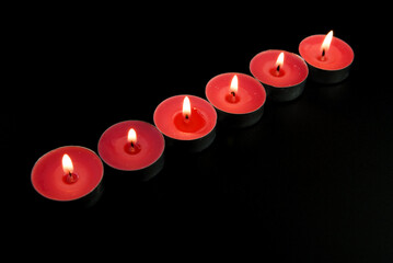 three burning candles