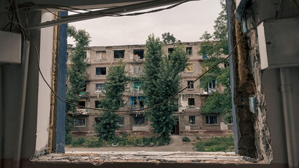 ruined street and destroyed houses in Kiev war in Ukraine