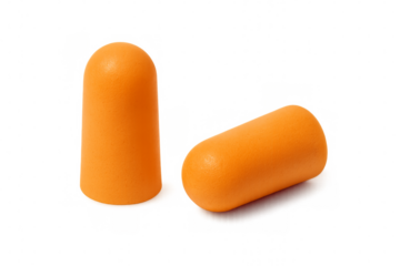 Orange foam earplugs protecting ears from noise