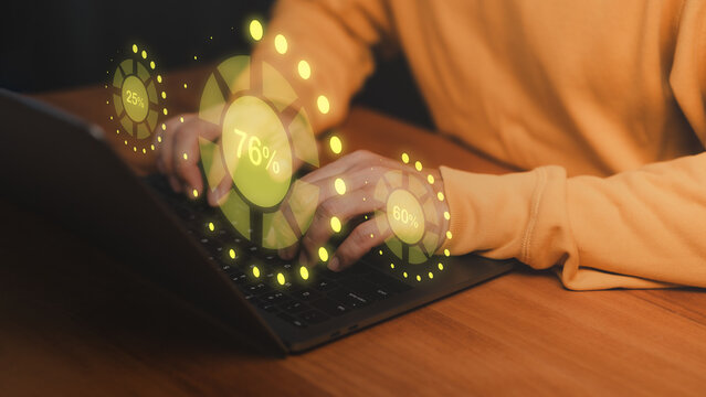 Hands typing on laptop computer with glowing percentage progress indicators, symbolizing data analytics, performance metrics, digital dashboard, business growth, and modern technology visualization.