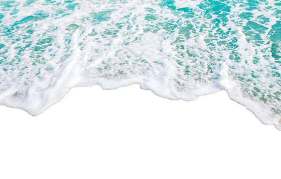 Ocean waves gently crashing on shore with foamy white surf