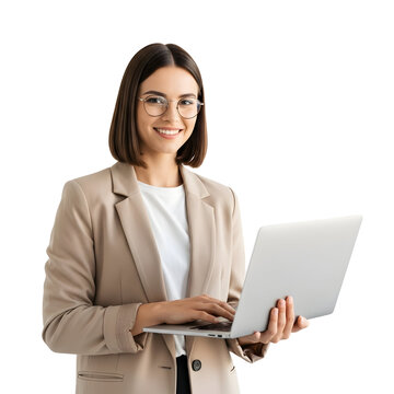 A young professional woman in a beige blazer smiles while holding a laptop and looking at the camera