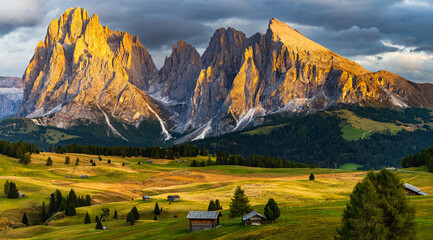 Fototapeta premium The UNESCO site Seiser Alm or Alpe di Siusi the Dolomite plateau and the largest high-elevation Alpine meadow in Europe located in Italy's South Tyrol province in the Dolomites in autumn sunset.