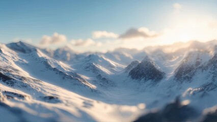 Snowy mountain range, sunlit peaks