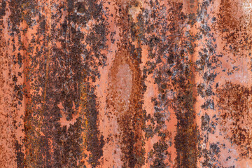 Orange rusty metal texture with corroded surface and weathered industrial details