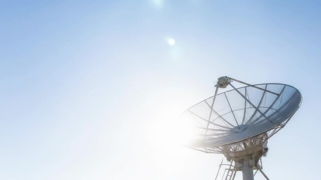 Satellite dish antenna against clear blue sky, telecommunications technology equipment for communication and science. Radio telescope parabolic reflector.