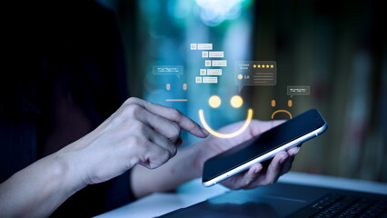 Businesswoman using smartphone with customer feedback and rating icons, showing digital review...