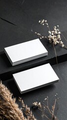 Blank Business Cards on Dark Textured Surface with Dried Floral Accents Minimalist Mockup