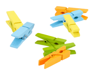 brightly colored wooden clothespins for laundry and craft projects