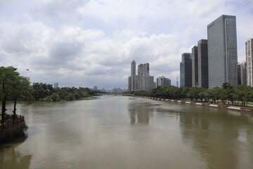 Obraz premium Guangzhou city, Guangdong, China, 2025. Pearl Zhujiang River and city skyline. 