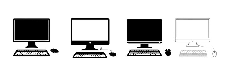 Fototapeta premium Four computer setups with keyboards and mice desktop