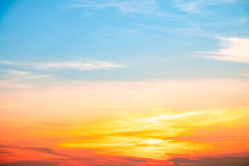 Beautiful , luxury soft gradient orange gold clouds and sunlight on the blue sky perfect for the background, take in evening,Twilight, Large size, high definition landscape photo