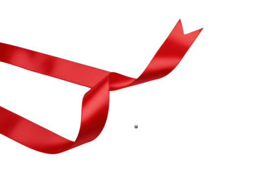 A bright red glossy satin ribbon with a swallowtail cut and tiny polished silver bead, elegantly draped on a transparent background with high-key studio lighting, concept of elegant craftsmanship