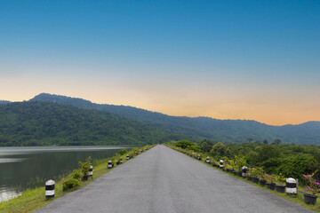 Scenic view of the road in Huai Prue Reservoir the early morning hours. Nakorn Nayok, Thailand.