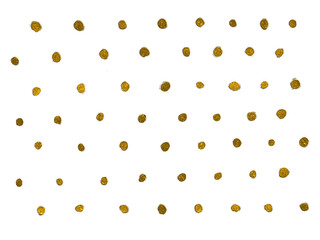 金色の油絵の具で描かれた水玉模様