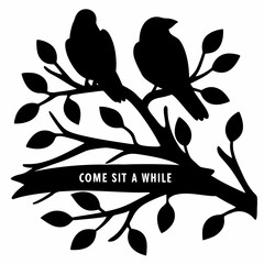 Silhouette of two birds perched on a tree branch with leaves