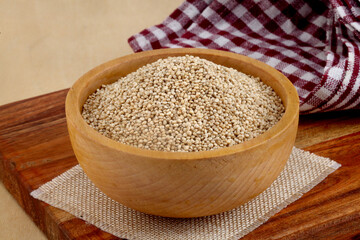 Quinoa seeds in wooden bowl,close up