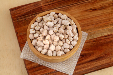 White chickpeas-Garbanzo beans in wooden bowl