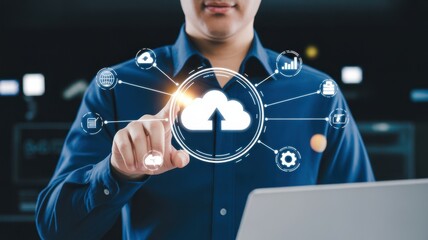 Digital Cloud: A professional person touching a digital cloud icon on an interactive screen, demonstrating the seamless integration of technology and data management.