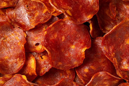Spanish chorizo crisps in a stone board. A high protein snack.