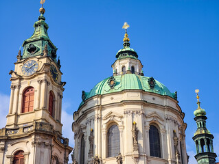 Fototapeta premium Prague St Nicholas Church Baroque Architecture with Dome and Clock Tower Historic Landmark in Czech Republic Old Town