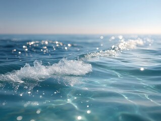 Gentle Ocean Ripples Under Clear Blue Sky with Sun Reflections Creating Tranquil Waterscape