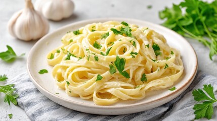 Creamy Fettuccine Pasta with Fresh Parsley and Garlic on a Light Background Perfect for Food Photography and Culinary Art Display