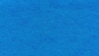 Obraz premium On blue background closeup felt fabric texture soft material concept for craft and textile design cozy minimal atmosphere