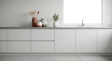 Modern minimalist kitchen with sleek cabinets and subtle decorative elements on the countertop.