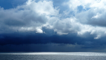 leaden clouds and rain and sun on the crossing from the Baltic island of Bornholm in Denmark to Germany