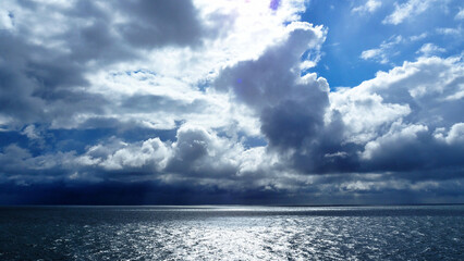 leaden clouds and rain and sun on the crossing from the Baltic island of Bornholm in Denmark to Germany
