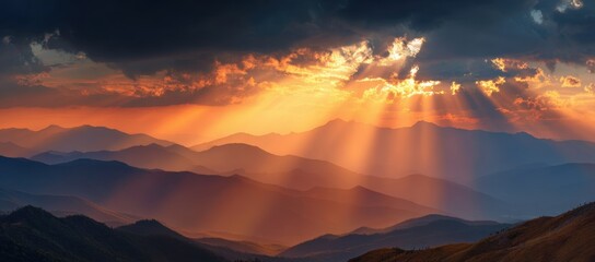 Majestic Sunset Over Mountain Range with Dramatic Cloud Formation