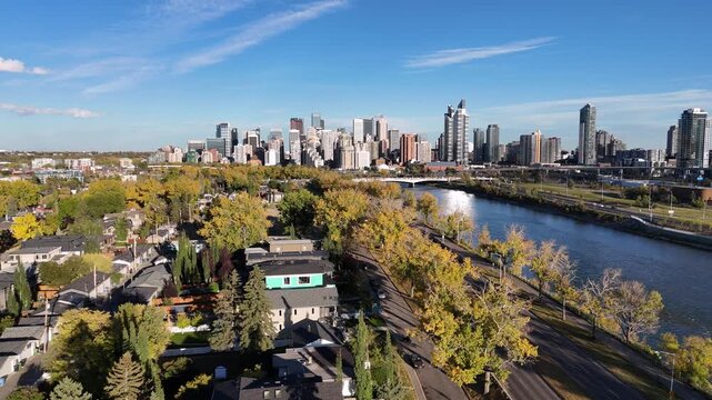 Aerial view of Calgary's downtown from along the Bow River on the west side of downtown looking east close to Memorial Drive. 