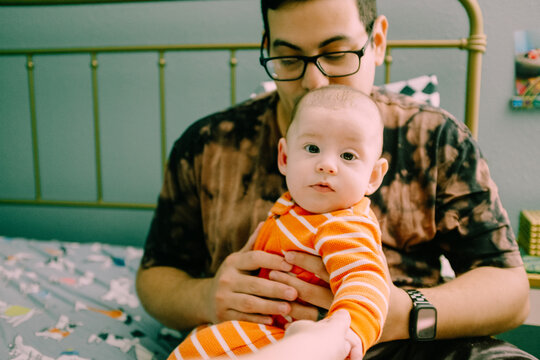 dad holding baby boy