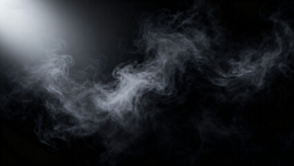 Smoke swirling in dark space with light beam