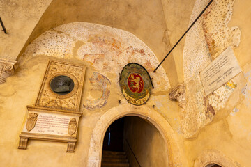 Obraz premium Pienza municipality coats of arms and Piccolomini plaque