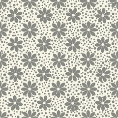 Fototapeta premium A charming repeating pattern of small grey flowers scattered across a speckled beige background.