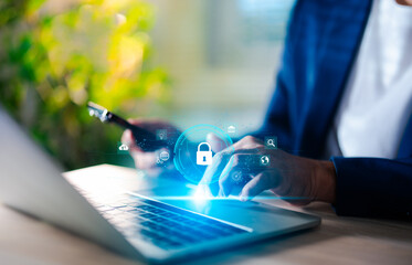 Hand of a man using mobile phone and laptop, secure access to user personal information, secure...