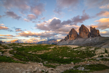 Naklejka premium Famous Tre Cime di Lavaredo at summer time. Landscape of Alps Mountains. Dolomites, Alps, Italy, Europe (Drei Zinnen)