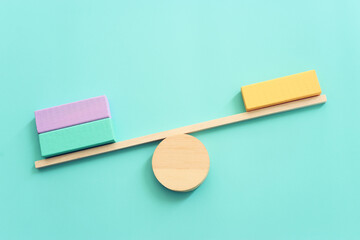 Concept image of wooden scale. Idea of measurement and finding balance