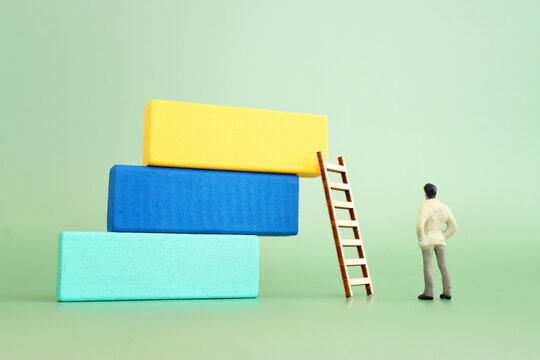 Business image of wooden ladder and person, human resources and management concept